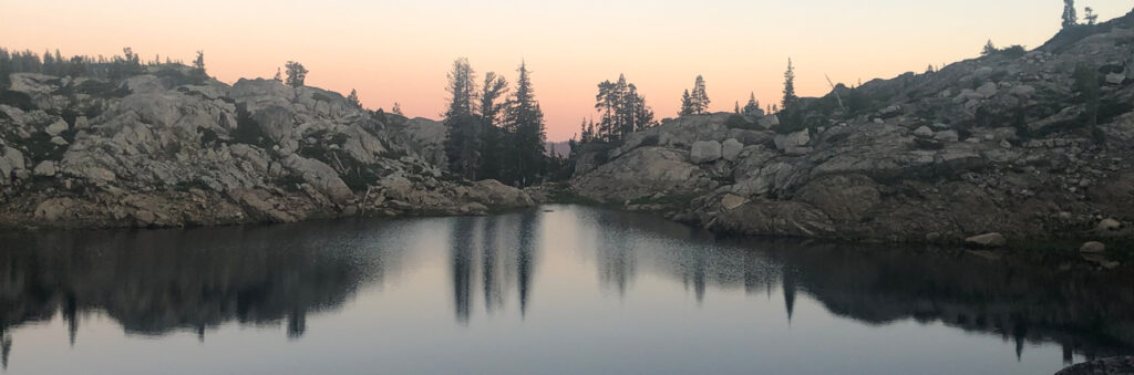 Fine art print featuring a sunset photograph of Downey Lake near Lake Tahoe, California, with layered geometric shapes over the reflective alpine landscape.