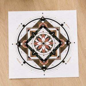 ompass Rose Drishti Card featuring geometric artwork on a wood surface