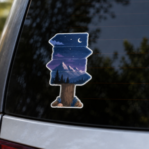 Mountains Trailhead mountain sticker displayed on the rear window of a vehicle